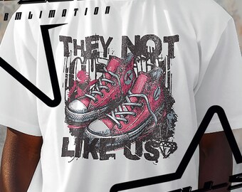May include: A white t-shirt with a graphic print of red and white sneakers with the text "They Not Cute Like Us" and the text "WOBY-SOBY Art & Sublimation" on the front.