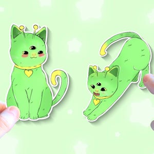Adesivo in vinile con gatto alieno cosmico / Adesivo in vinile con gattino spaziale / Graziosa decorazione artistica con gatto extraterrestre per computer portatili, diari, custodie per telefoni, bottiglie d'acqua e molto altro!