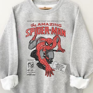 spiderman shirt, marvel shirt, peter parker tee, spider man tee, superhero shirt, vintage spiderman, comic book tee, marvel graphic tee, superhero gift, classic marvel tee, comic spiderman tee, marvel comics tee, spiderman birthday