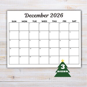 May include: A white calendar page for December 2026 with black text and grid lines. The calendar features a dark green triangular graphic at the bottom right corner with a yellow star on top and the white text 3 SIZES printed inside the graphic.