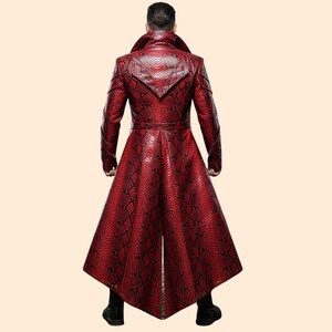 May include: A long, red coat with a snakeskin pattern. The coat features a wide collar, a belt at the waist, and a flared skirt. The coat is made of a leather-like material and has a dramatic, eye-catching design.