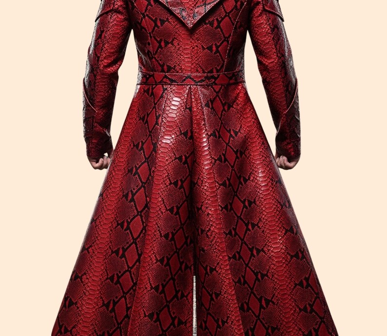 May include: A long, red coat with a snakeskin pattern. The coat features a notched collar, long sleeves, and a belted waist. The fabric has a textured appearance with black accents, creating a striking visual effect. The coat's design suggests a dramatic, high-fashion aesthetic.