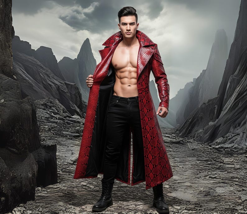 May include: A red, long leather coat with a snakeskin pattern. The coat is open, revealing a black lining. The person is wearing black pants and boots. The background features a rocky landscape.