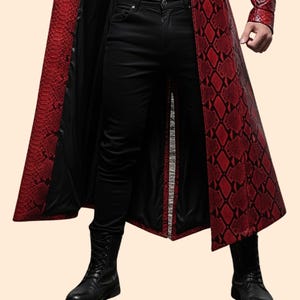 May include: A long, red and black snakeskin-patterned coat with a black interior. The coat is paired with black pants and black boots. The coat's design is a striking visual element.