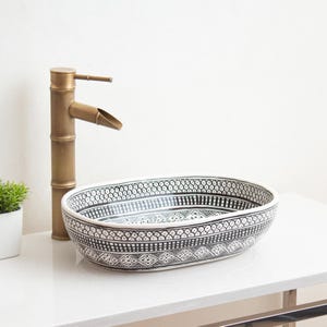 Lavabo marroquí ovalado de cerámica artesanal - Lavabo tradicional en blanco y negro - TerraFez