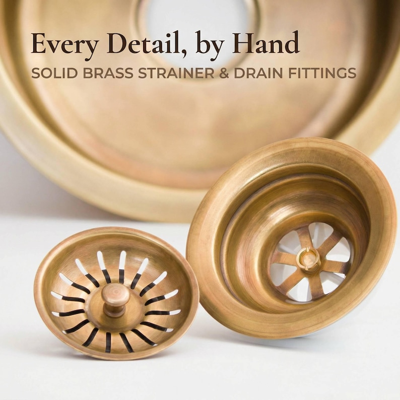Close-up detail of TerraFez handcrafted solid brass strainer basket and drain flange fittings, showing artisan craftsmanship and matching patina finish.