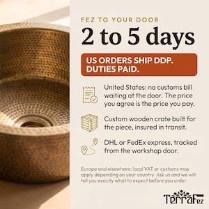 May include: A round, hammered brass sink basin with a metallic gold finish. The image includes text detailing shipping information: FEZ TO YOUR DOOR, 2 to 5 days, US ORDERS SHIP DDP. DUTIES PAID, and information regarding customs, wooden crates, and courier services.