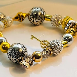 Rhinestone Charm Bracelet: Gold & Silver Filigree Beads, Key Charm