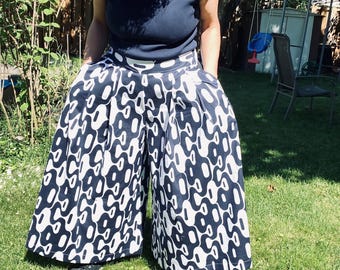 Skirt pants  long or short one size fits up  to size XL
