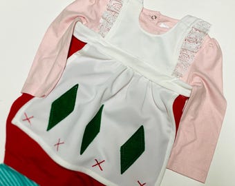 Toddlrs Outfit ist von der Strawberry Shortcake-Figur inspiriert.