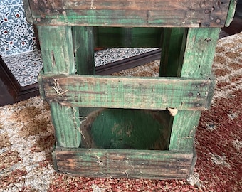 Vintage wooden crate with vintage Carboy glass 5 gallon water bottle