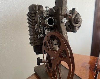 Antique Revere Eight film projector,  good working condition. The perfect addition to the film enthusiast’s collection