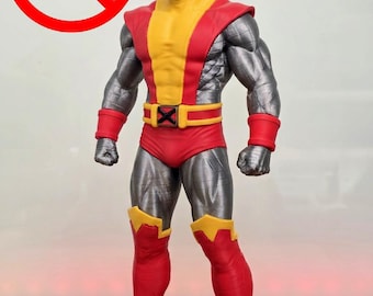 May include: A standing action figure of a muscular character with metallic silver skin, wearing a red and yellow bodysuit with a belt featuring an X emblem. The figure has short black hair and red boots, with a red circle logo containing the text AMS.