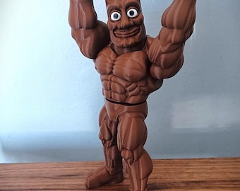 May include: A brown, 3D-printed muscular figure with a flat-topped head and googly eyes, standing in a powerful pose while holding a horizontal brown club above its head with both hands, showcasing defined chest and arm muscles.