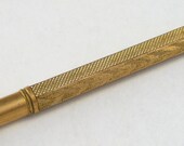 Rosy Gold Retractable Pencil Ladies Pendant