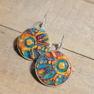 My "Sunflower" inspired clay earrings shown here with a leverback closure.