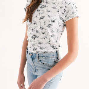 Adult Dinosaur Shirt With Short Sleeves On A White Women's Tee With Dino Art Pattern