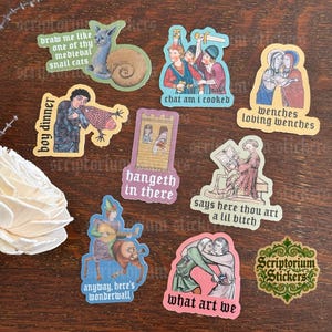May include: A collection of nine die-cut stickers featuring medieval-style illustrations with humorous text including 'draw me like one of thy medieval snail cats', 'chat am i cooked', 'wenches loving wenches', 'boy dinner', 'hangeth in there', and 'anyway, here's wonderwall'.