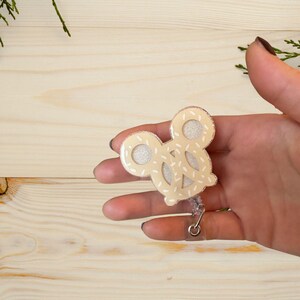 Mickey Pretzel Badge Reel