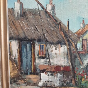 May include: A painting of a small, white cottage with a thatched roof. The cottage has a single window and a wooden door. The painting is done in a realistic style with a focus on the details of the building.