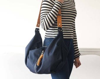 Crossbodytas van blauw canvas en bruin leer, gekruiste tas hobo-tas alledaagse weekendtas - Crossbodytas Kallia