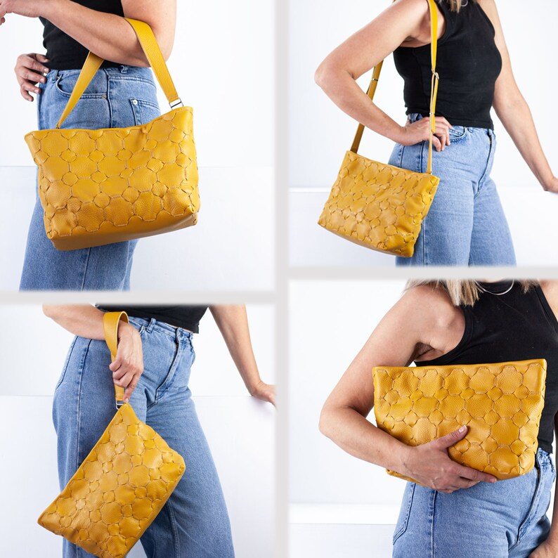 May include: A yellow leather handbag with a quilted pattern. The bag has a long strap and can be worn over the shoulder or carried by hand.
