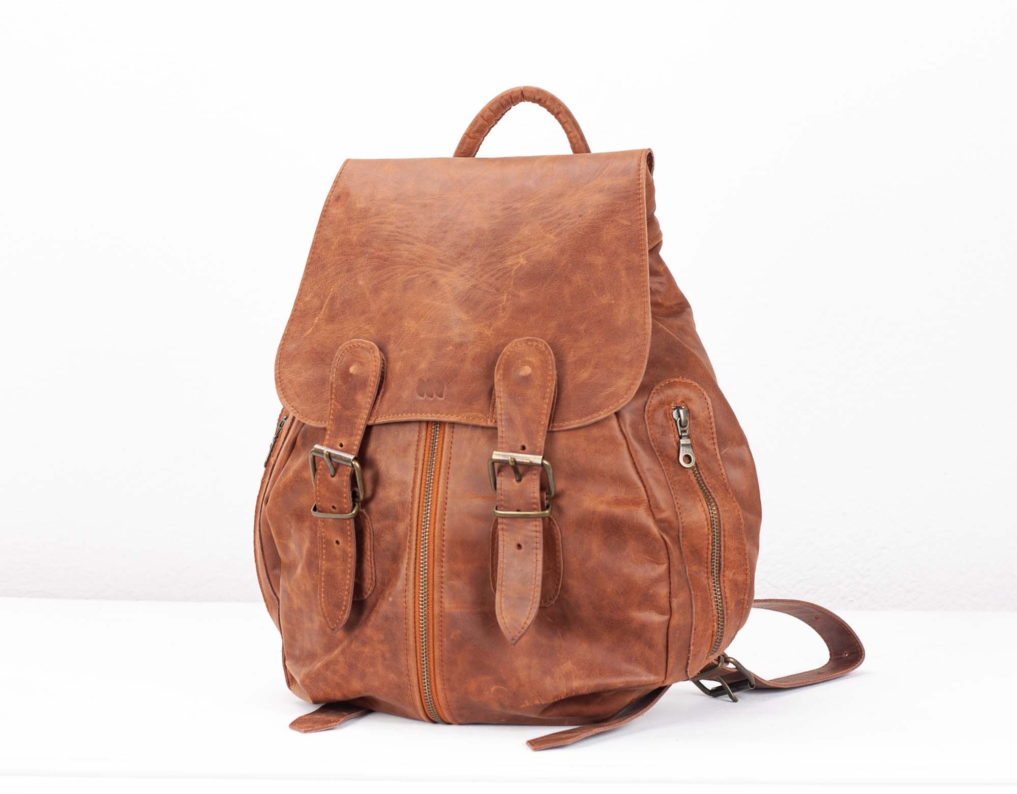 large brown leather backpack