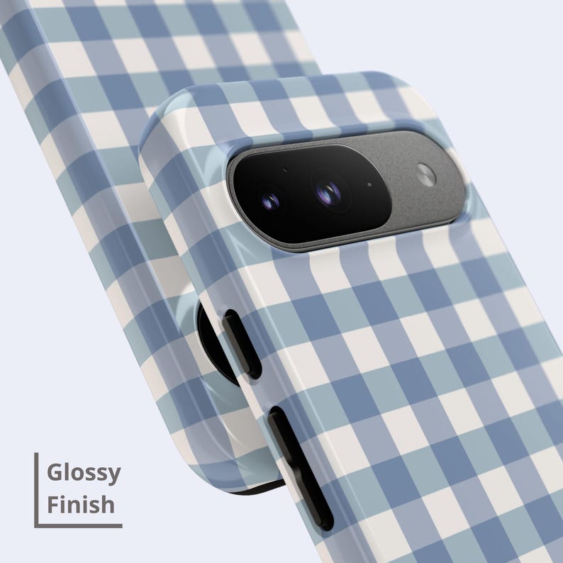 May include: A smartphone case featuring a light blue and white gingham check pattern with a glossy finish. The case has a cutout for the camera module and black side buttons. The text "Glossy Finish" is printed in the lower left corner.