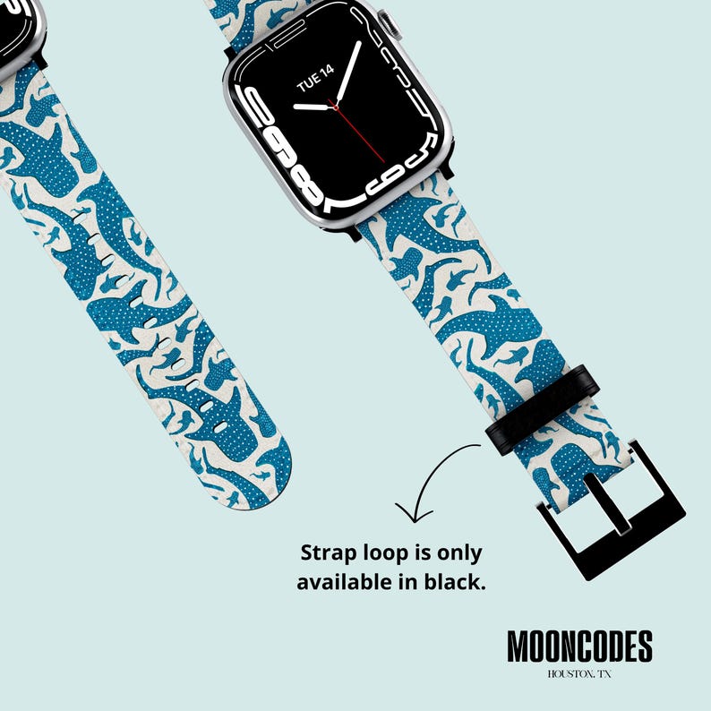May include: White watch strap featuring a blue whale design, attached to a black Apple Watch. The strap loop is only available in black. The brand name "MOONCODES" is visible.