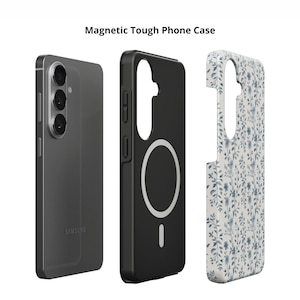 May include: A black magnetic phone case with a white circular design and a floral patterned case. The phone is a dark gray color. The text "Magnetic Tough Phone Case" is at the top of the image.
