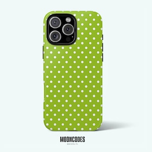 May include: A lime green phone case with a white polka dot pattern. The case has a black camera module and the brand name "MOONCODES" is printed at the bottom. The case is designed to fit a smartphone.