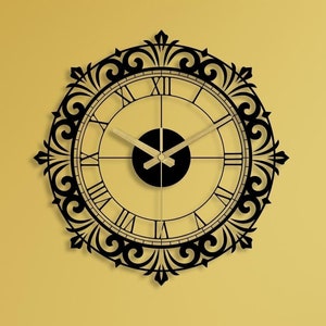 May include: A black ornate clock with Roman numerals on a yellow wall. The clock has a gold-coloured hour and minute hand. The clock is hanging on a yellow wall in a living room setting.