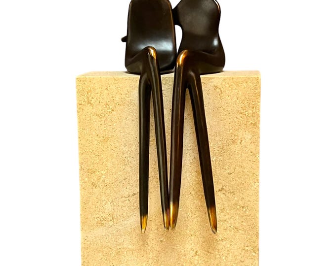 LGBTQ love two women sitting sculpture