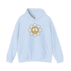 Gelbes Peace Zeichen im Blumen Hoodie