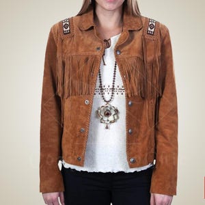 Western Suede Jacket, Women Western Jacket, Women Vintage Style, Cripple Creek, Women Stylish Jacket, Traditional Jacket, native American, WomenBuckskin Jacket, Western Native Jacket, Women Tassel Jacket, Western Suede Coat, Women Western Coat, Women buckskin jacket	

Gift For Her, Western Suede Jacket, Women Western Jacket, Women Vintage Style, Cripple Creek, Women Stylish Jacket, Traditional Jacket, native American, WomenBuckskin Jacket, Western NativeJacket, Women Tassel Jacket, Western Coat
