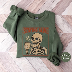 Staying Alive Sweatshirt Halloween Sweatshirt Trendy Coffee Sweatshirt Funny Skeleton Hoodie Coffee Lovers Gift Retro Halloween T-Shirt