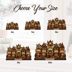 May include: A collection of five miniature Christmas village building sets arranged in a grid, labeled with sizes 4in, 5in, 6in, 8in, and 10in. Each set features detailed storefronts, warm interior lighting, and festive decorations on a dark base.