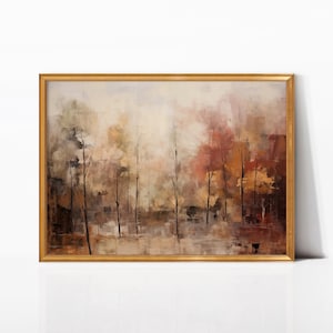 Puede incluir: Pintura abstracta de paisaje en un marco dorado. La obra presenta una paleta de colores apagados de marrones, rojos y verdes, con siluetas de árboles verticales. La pintura evoca una sensación de profundidad y atmósfera, con un efecto suave y borroso.