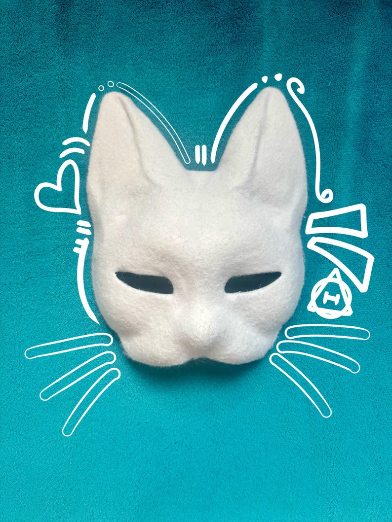 May include: A white cat mask with pointed ears and narrow eye openings. The mask is decorated with white line art illustrations including a heart, whiskers, and abstract shapes surrounding the feline face, set against a solid teal background.