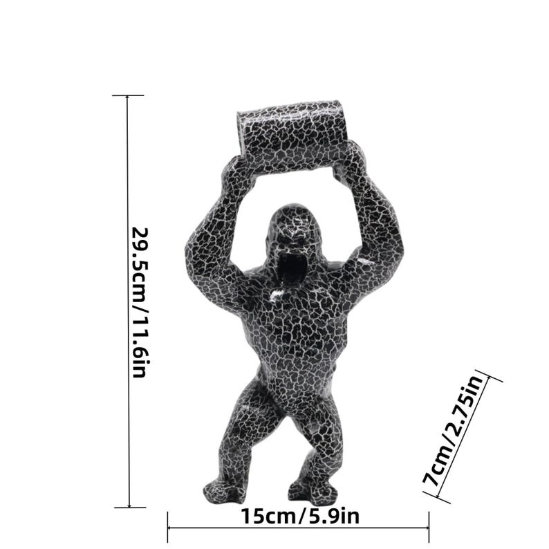 May include: A black and white crackle-patterned gorilla figurine holding a cylinder above its head. The figure measures 11.6 inches in height, 5.9 inches in width, and 2.75 inches in depth as indicated by the visible dimension lines.