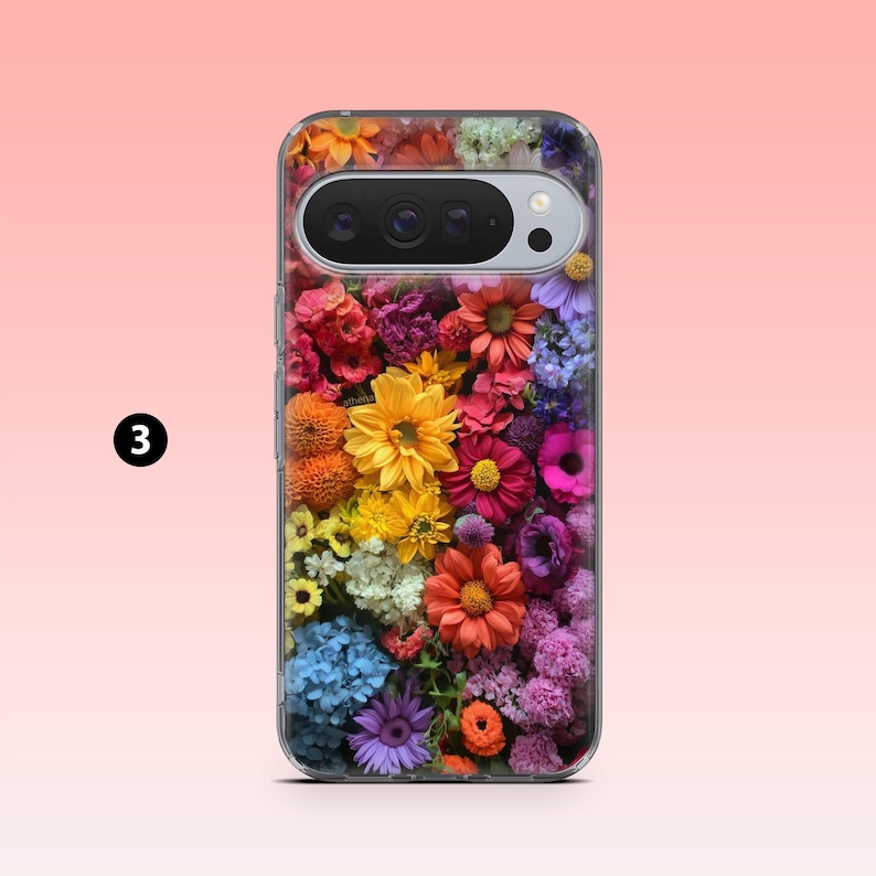 May include: A clear phone case with a colourful floral pattern. The case is filled with a variety of flowers in shades of yellow, orange, pink, purple, and blue. The phone's camera and flash are visible through the case.