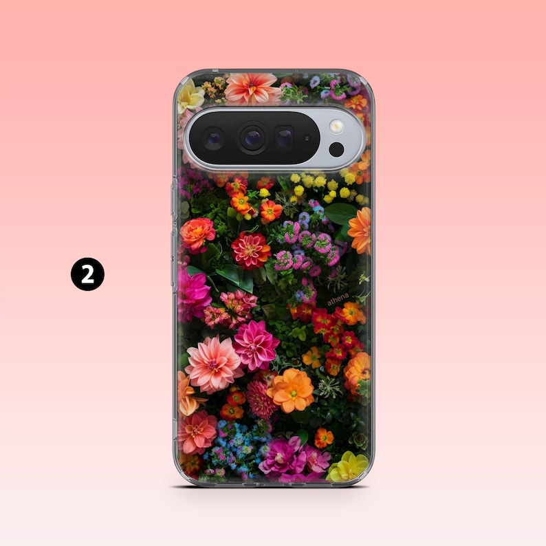 May include: A clear phone case with a colourful floral pattern. The case is filled with a variety of flowers in shades of pink, orange, yellow, and red. The phone's camera and flash are visible through the case.