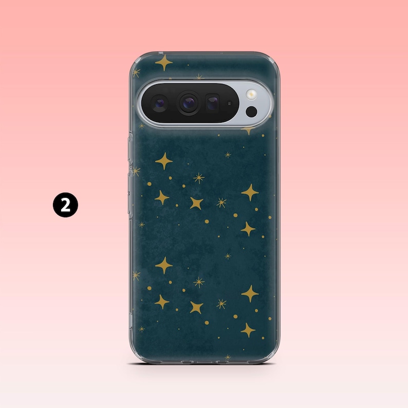 May include: A teal phone case with a constellation of gold stars. The case has a clear border and a camera cutout. The background is a gradient of pink and peach.