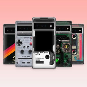 May include: A collection of five phone cases with unique designs. The cases feature retro themes, including a Game Boy, a cassette tape, and a circuit board. The cases are clear with the designs visible on the back, and they are displayed against a pink background.