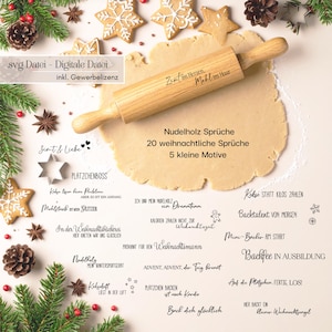 May include: A wooden rolling pin sits on a circle of dough, with gingerbread biscuits, pine needles, and text. The rolling pin has text on it. The image has a festive, holiday theme.