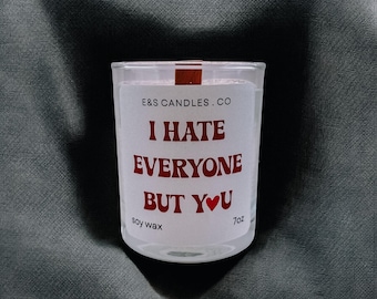 A scented candle with a fun sticker 'I Hate Everyone But You'. The perfect gift for loved onesher, for you, your friends and for him.