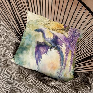 A Watercolor Dragon adorns this square throw pillow.