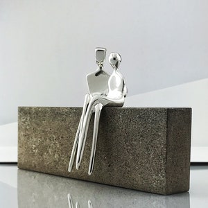 CARESS >>  Silver edition!  Beautifully finished silver sculpture.  Perfect 25th wedding anniversary gift!
