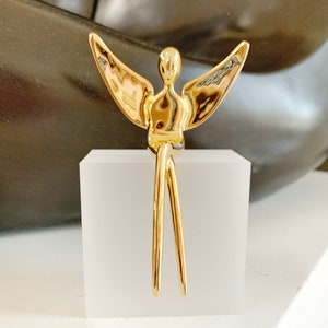 Gold Angel in 3”, sitting angel figurine, gold-plated silver angel wings. Mounted on opaque acrylic block.