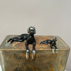 Black dog bronze sculpture. image 2